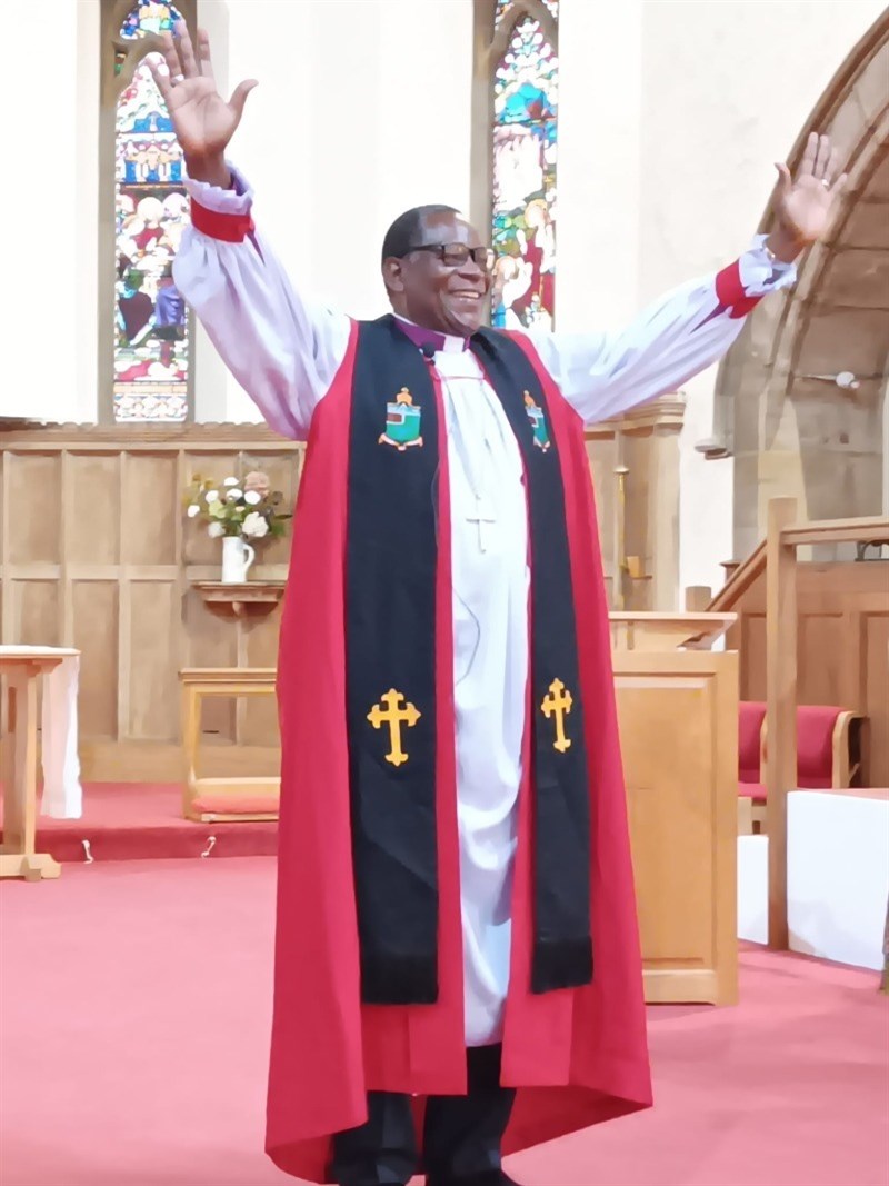 Bishop Given greeting St James